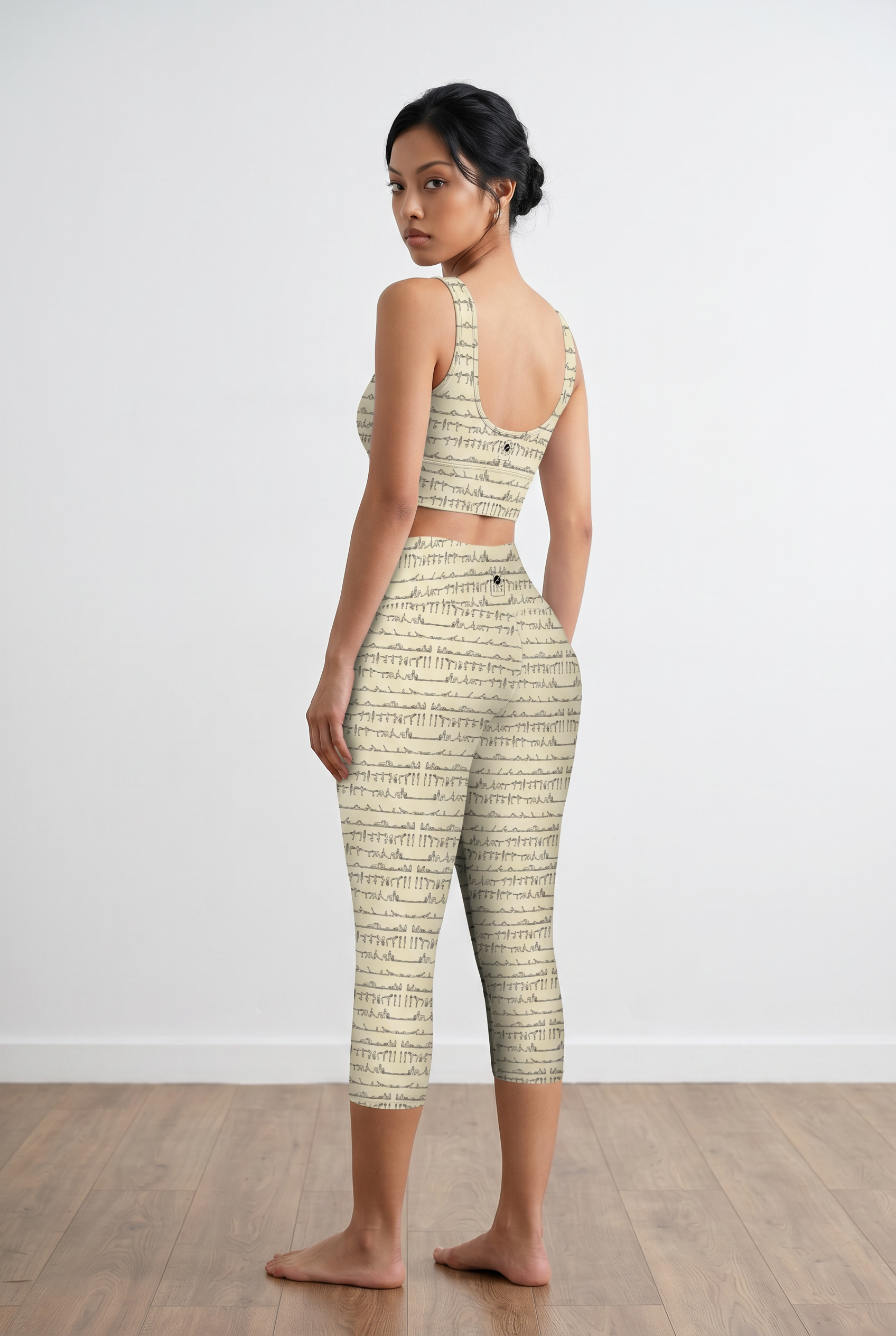 Bikram Pastel iSquared Crop Top with U-back, removable pads, cropped fit, and pastel all-over print