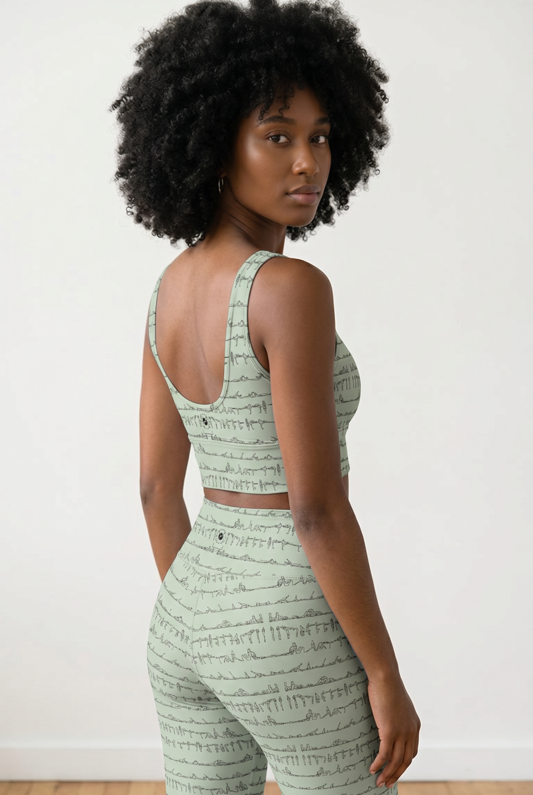 Bikram Pastel iSquared Crop Top with U-back, removable pads, cropped fit, and pastel all-over print